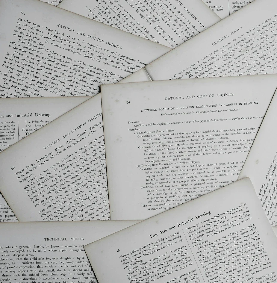 This image shows several pages of an open book with text, likely related to academic or scientific research. This is part of a blog titled "The Ultimate AI Tool For Academic Research"